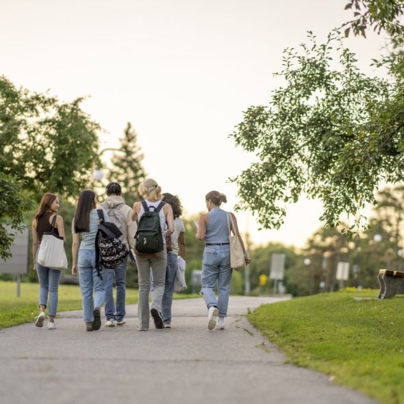 students walking across campus