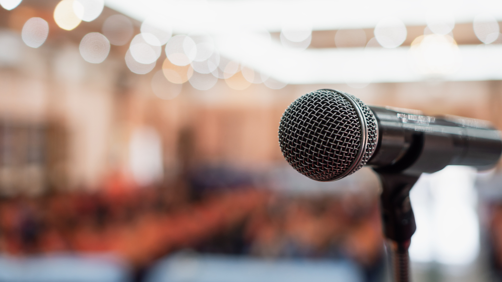 Microphone in front of a crowd